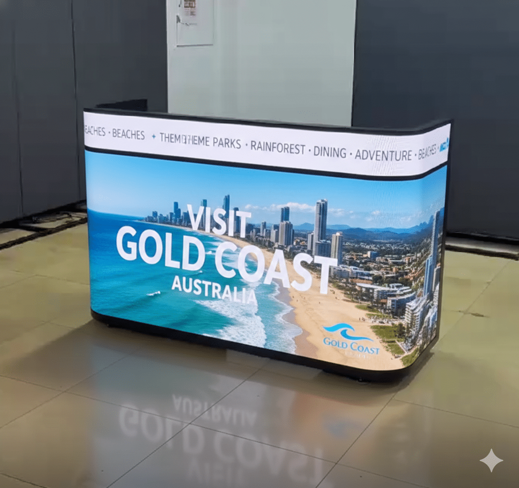 LED Booth with curved wrap-around P1.8 LED screen displaying Visit Gold Coast